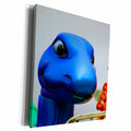 3dRose Blue Dino Ride Plastic head - Museum Grade Canvas Wrap (cw_155954)