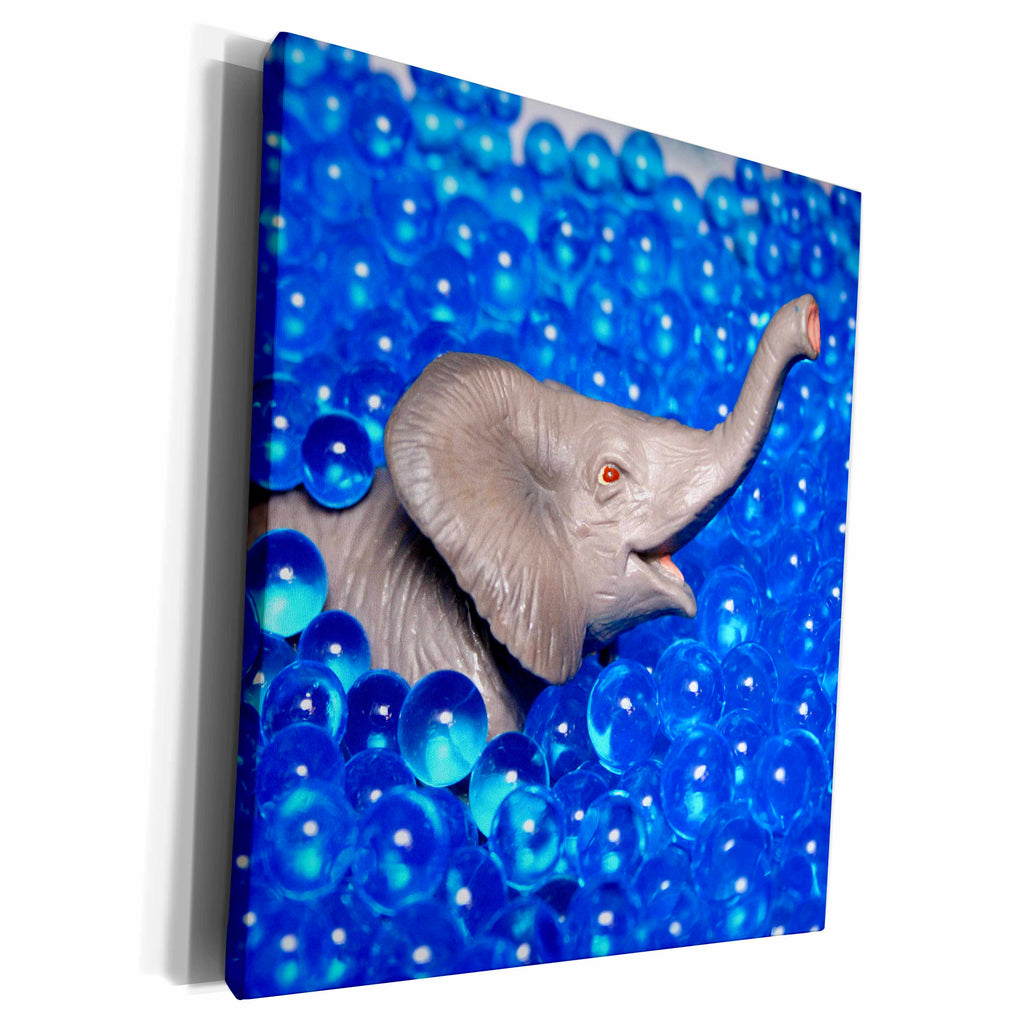 3dRose grey plastic elephant in blue balls - Museum Grade Canvas Wrap (cw_185150)