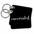 Key Chain - Vaccinated. White cursive lettering on black background. Stamp City - typography