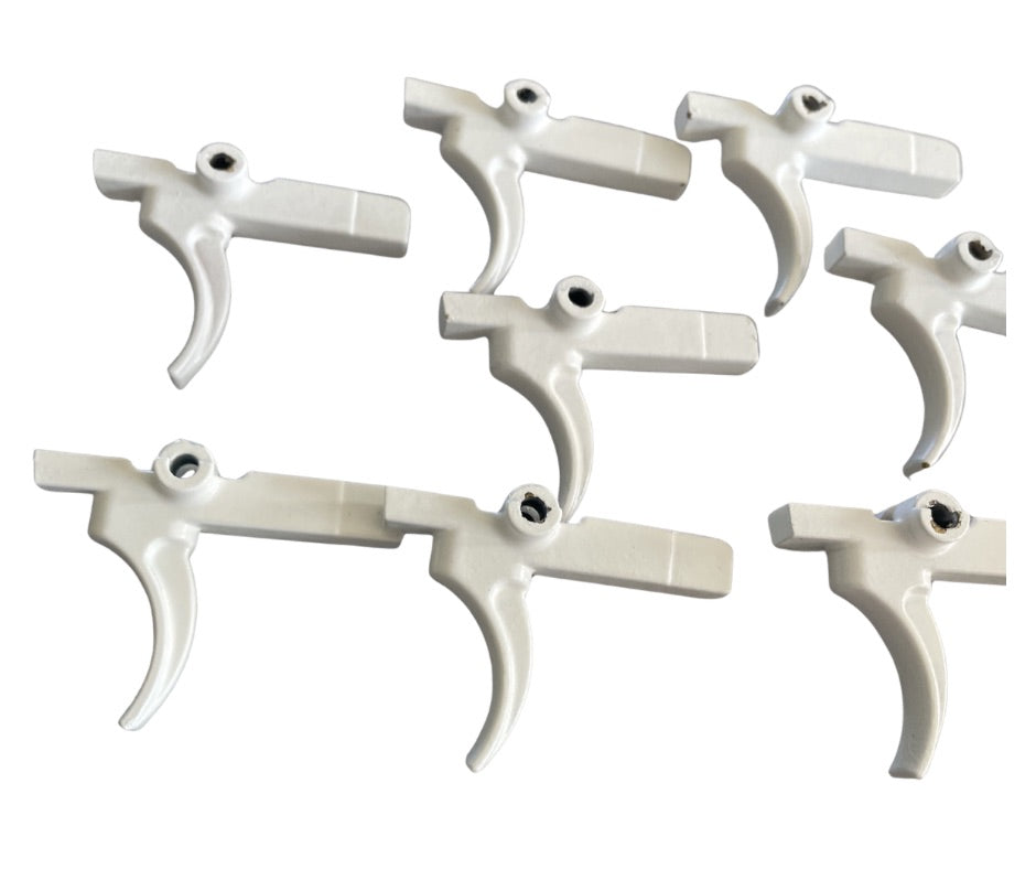 Snow Patrol White Cerakote Trigger Supply: Super Safety – S7 Tool Steel – Curved Trigger | AR-15 USA Made