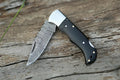 Custom Damascus Folding Knife – 7” Buffalo Horn Handle with Steel Bolster & Leather Sheath