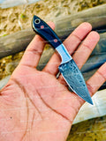 Custom handmade Damascus steel skinning knife